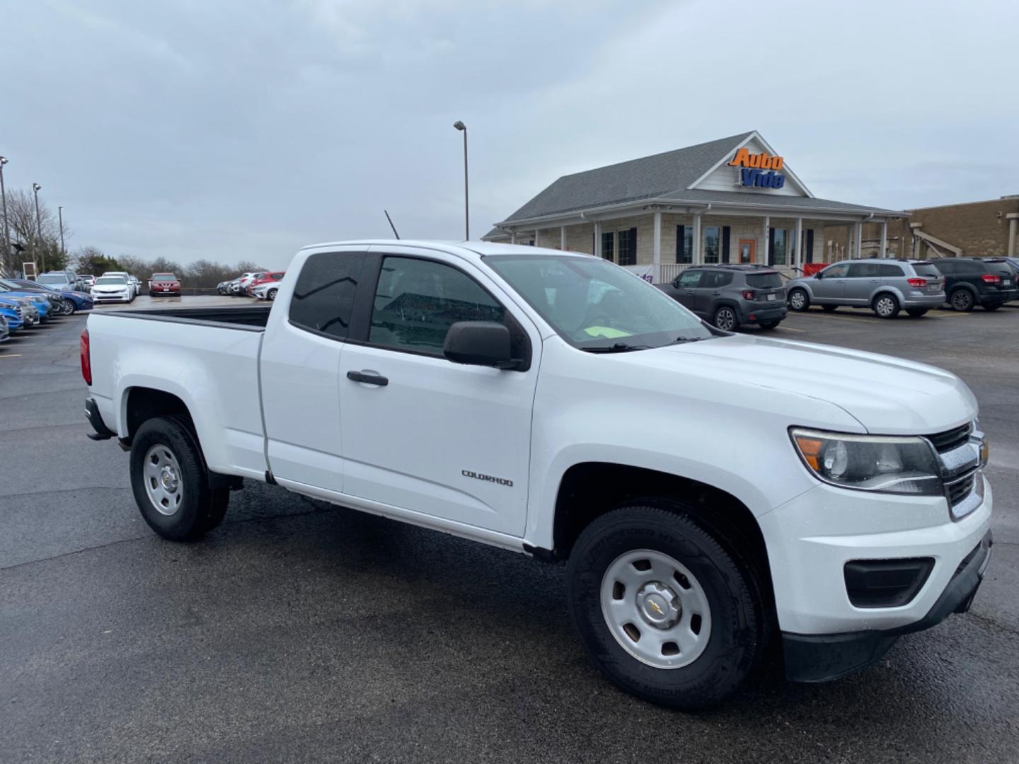 2015 WHITE Chevrolet Colorado WT Ext. Cab 2WD (1GCHSAEA6F1) with an 2.5L L4 DOHC 16V GAS engine, 6-Speed Automatic transmission, located at 420 I-35E, Lancaster, TX, 75146, (469) 297-4144, 32.593929, -96.823685 - Photo#2